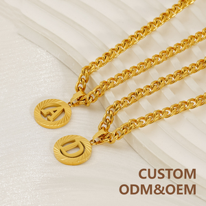 สร้อยคอจี้สแตนเลสสตีลแบบ<span class=keywords><strong>ก</strong></span>ำหนดเอง CAIOOCHE ชุบทอง 26 ตัวอักษร แบบกลวง <span class=keywords><strong>ท</strong></span>รงกลม โซ่คิวบา สำหรับผู้หญิง - Product Image 1