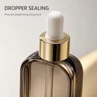 Flacon compte-gouttes plat en verre de luxe 30ml 50ml avec bouchon doré, personnalisable avec logo estampé à chaud, pour diffuseur de parfum et cosmétiques essentiels