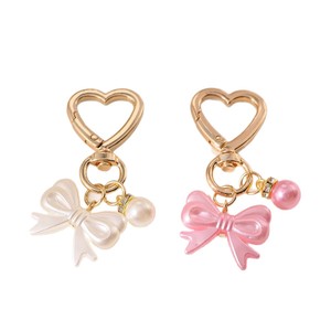AM Fris en zoet strikje parel gouden deurknop sleutelhanger hanger schattig hoofdtelefoon etui tas hangend ornament - Product Image 1