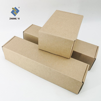 Vente en gros d'emballages cadeaux noirs Boîte postale en papier Boîtes postales en carton ondulé d'expédition avec logo personnalisé