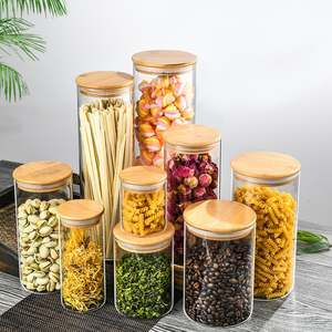 Portacandele in <span class=keywords><strong>vetro</strong></span> di lusso con coperchi di bambù eleganti barattoli di lanterna per condimenti alimentari eco-friendly copertura sana di alta qualità - Product Image 1