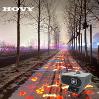 Projection LED interactive multicolore pour sol, portable et légère, idéale pour les événements en plein air et les aires de jeux pour enfants.