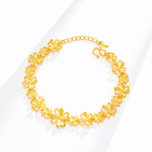 <span class=keywords><strong>24</strong></span> <span class=keywords><strong>carats</strong></span> plaqué <span class=keywords><strong>or</strong></span> quatre feuilles creux fleur <span class=keywords><strong>bracelet</strong></span> femmes laiton givré voiture fleur mode main bijoux en gros - Product Image 1