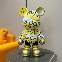Sculpture en résine personnalisée de nouvelle conception, dessin coloré, statue d'ours, décoration d'intérieur, sculpture d'art d'ours graffiti avec tirelire