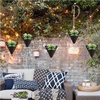 Nouveau pot de fleur en triangle noir non tissé transfrontalier sac suspendu balcon intérieur créatif suspendu mur panier de fleurs pot de plante