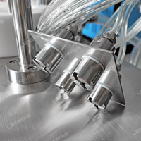 Meilleure machine semi-automatique pneumatique de 200 ml pour flacons de parfum, d'huile moteur, de lotion pour eau de toilette, 4 têtes, haute précision