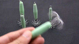 Vente en gros de crochets de gabarit lumineux en acier inoxydable 12 broches Tube de soufflage Parapluie hameçons de pêche <span class=keywords><strong>au</strong></span> calmar sans barbe hameçons de calmar fabriqués - Product Image 4