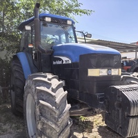 Tracteur à quatre roues motrices New Holland TM175 d'occasion avec 175 chevaux, adapté aux équipements agricoles lourds