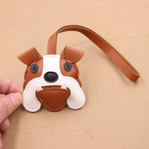 Lindo llavero colgante de piel sintética con diseño de cachorro de dibujos animados, de varias capas, plegable, para mochila - Product Image 1