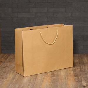 ถุงของขวัญกระดาษคราฟท์แบบใช้ซ้ำได้พร้อมหูหิ้วริบบิ้น KM Custom ราคาถูกจากจีน ขายส่งเครื่องประดับ Sacola Personalizada De Papel - Product Image 2