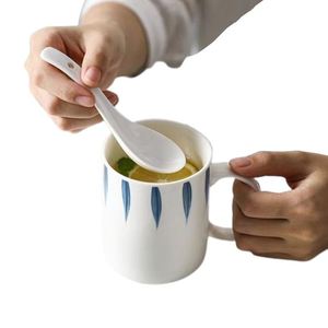 แก้วกาแฟเซรามิกแบบมินิมอลพร้อมหูจับ ปี 2026 สำหรับพิมพ์ลายด้วยความร้อน เหมาะสำหรับใช้ในบ้าน - Product Image 1