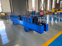 Machine de fabrication de portes à enroulement à motif gaufré Marocain, en liquidation de stock à prix d'usine, pour garages, ateliers, entrepôts et l'industrie
