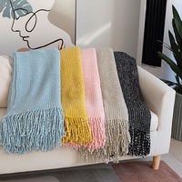 Plaid tricoté doux bicolore style nordique, couverture moelleuse en acrylique avec franges à pompons pour la décoration de canapé, couvre-lit et commandes en gros