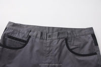 Pantalon de protection anti-coupure Sturdyarmor gris et noir pour tronçonneuse, protection des jambes pour les travailleurs forestiers et les sites de coupe de bois