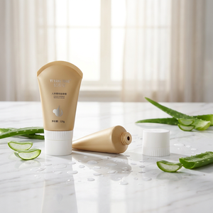 Tubo de PE dorado mate con impresión de texto personalizado, tubo suave con tapa de rosca acanalada blanca para crema de masaje de ginseng - Product Image 1