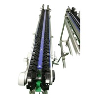 Chaînes de convoyage à palettes pour ligne de production à flux continu, section d'alimentation, pour la distribution de commandes en gros et le transport de lots, avec outillage personnalisé