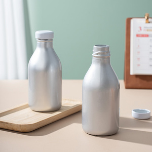 Botella de Vidrio Redonda Vacía de 200 ml para Bebidas Frías, Leche y Café Frío, de Grado Alimenticio, con Tapa Hermética, Venta al Por Mayor - Product Image 1