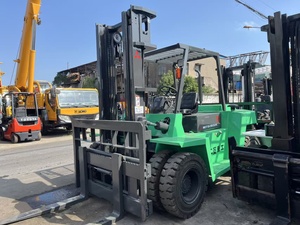 รถยกดีเซลมิตซูบิชิ FD7 ตัน สำหรับงานหนัก ขับเคลื่อน 4 ล้อ เสากระโดงสามตอน ยางลม ใช้ระบบไฮดรอลิก พร้อมอุปกรณ์เปลี่ยนทิศทางด้านข้าง ขนาด 1500x200x120 มม. - Product Image 3