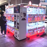 Lucky Baby Machine à griffes 4 joueurs, mini machine à poupées, machine de jeu d'arcade à monnayeur pour attraper des porte-clés, pour adultes et enfants