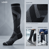 Chaussettes de compression sportives gris anthracite à compression graduée pour mollets, avec tableau de mesure, manchette plus large et bout plat