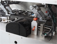 Machine d'emballage et de cartonnage pour semelles de chaussures