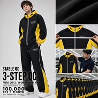 Ensemble de survêtement en nylon pour hommes grandes tailles, veste à capuche zippée color block et pantalon large, style streetwear, fournisseur en gros