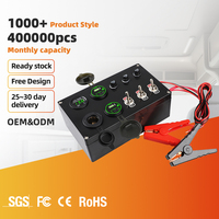 Boîtier d'alimentation multi-ports 12V/24V avec panneau de commutation 3 voies, chargeur USB double, voltmètre, allume-cigare et pince de batterie