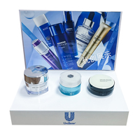 Présentoir cosmétique LED en acrylique de luxe moderne de haute qualité, personnalisable en couleur, 5 étagères pour huiles essentielles et parfums