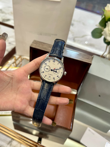 Reloj automático para hombre con esfera color crema, indicador de reserva de energía y correa de cuero azul para uso formal e informal - Product Image 2