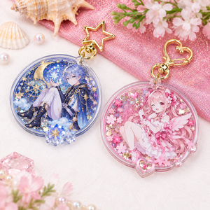 Llavero de acrílico de anime con diseño de muñeca redonda, colgante de mosquetón ligero con incrustaciones, patrón de estrellas y lunas en rosa y azul - Product Image 1