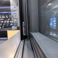 Ventana Corredera Horizontal Moderna de Aleación de Aluminio, Marco Delgado de Acero Inoxidable, Diseño Insonorizado para una Vista Despejada de la Cocina