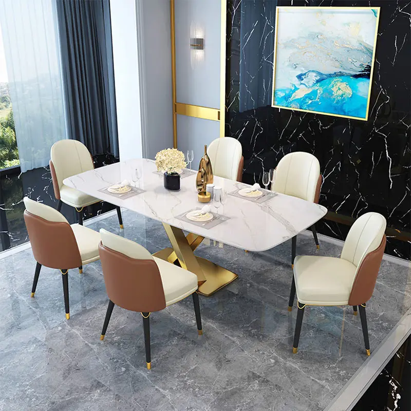 Foshan 2.2 2.4 metre uzun sinterlenmiş taş seramik yuvarlak cam mobilya İskandinav yemek masası ve sandalye kombinasyonu seti 6 kişilik