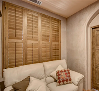 Portes coulissantes et pliantes en bois teinté de luxe sur mesure en Paulownia et Tilleul pour Villas et Hôtels