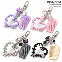 NEWYEAH Porte-clés tendance en forme de cœur irrégulier effet goutte d'eau, avec décorations en cristal brillant, en acétate, avec peigne à dents larges, pour femme