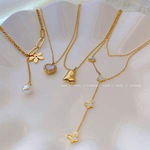 Collana XIXI Antiossidante con Ciondolo a Cuore e <span class=keywords><strong>Farfalla</strong></span> in Acciaio Inox 18K Placcato Oro con Zirconi per Donna - Product Image 2