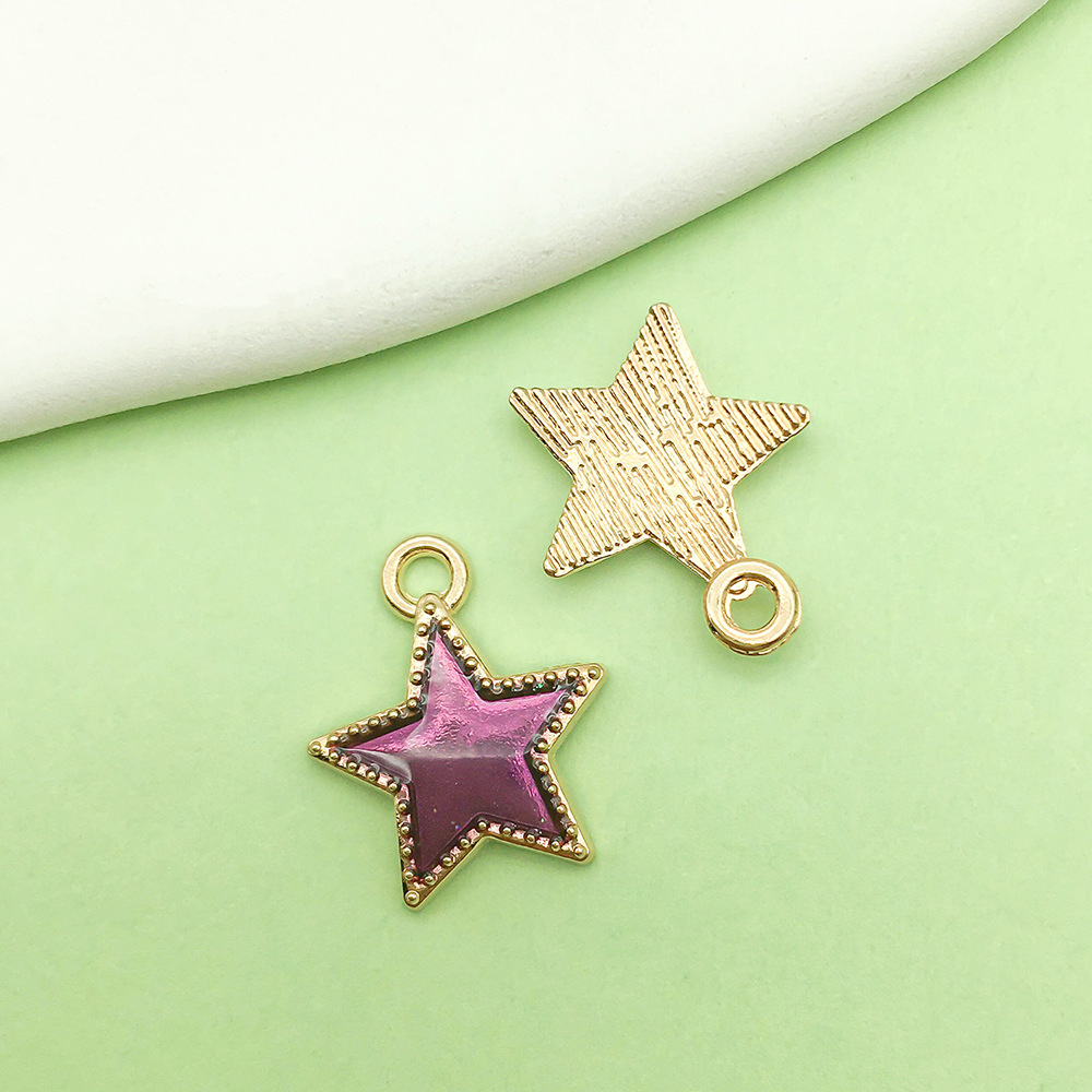 Una estrella morada de cinco puntas con gotas de aceite, 13*15 mm, 0,5 g, 13311