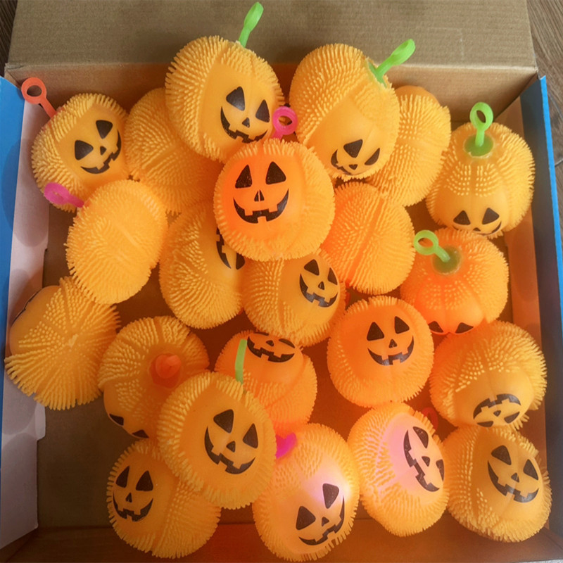 Glow-in-the-dark pumpkin plush ball