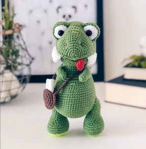 Crochet un dinosaurio divertido con una lengua que sobresale juguetes tejidos a mano con hilos de algodón dinosaurio Amigurumi juguetes para niños