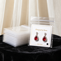 Emballage en vrac personnalisé de bijoux de luxe avec logo sacs en plastique PVC avec fermeture éclair pour collier boucles d'oreilles bague