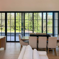 Porte en verre à arche française en alliage d'aluminium haute durabilité, isolation thermique, cadre en grille noire, pour villa et hôtel, extérieur