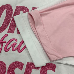 Vente en gros T-shirt 100 coton respirant coupe ample à ourlet irrégulier T-shirt à paillettes pour femmes de couleur unie avec épaules tombantes - Product Image 5