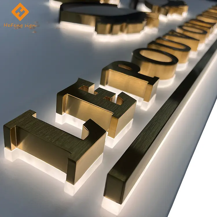 Letras de canal publicitarias retroiluminadas 3D de acero inoxidable cepillado dorado con nombre de tienda Led personalizado