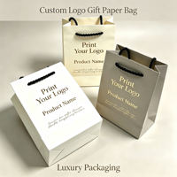 Sacs cadeaux de luxe personnalisés avec logo, en papier blanc mat laminé, dorure à chaud, réutilisables, imperméables et écologiques pour vêtements