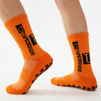 Chaussettes de football montantes tricotées à pois antidérapantes épaissies de haute qualité, très vendues, pour la vente en gros