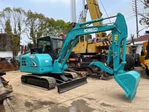 Mini-excavatrice Kobelco SK60 avec godet de terrassement d'une capacité de 0,12 m³, poids opérationnel de 6 tonnes, moteur Kawasaki, modèle Geospec - Product Image 3