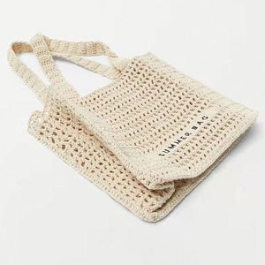 Bolso de mano de malla hueca de ganchillo para mujer, con logotipo personalizado, venta al por mayor, para playa - Product Image 2