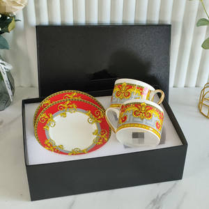 Vente flash Tasse à café et soucoupe Couple Tête dorée Créativité Personnalité Ensemble de tasses et d'assiettes avec boîte cadeau - Product Image 1