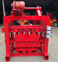 Machine à fabriquer des blocs de ciment creux et emboîtables QTJ4-35B pour travaux de construction