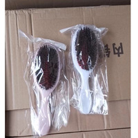 Brosse à cheveux ovale blanche rose personnalisée 100% poils de sanglier style plastique fait à la main avec emballage de logo personnalisé brosses à cheveux à la mode