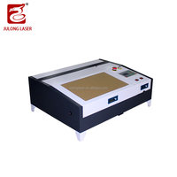 Machine de gravure et de découpe laser CO2 CNC pour bois, papier, acrylique, pierre, plastique, verre - Refroidie par eau, prise en charge IA, Nouveauté